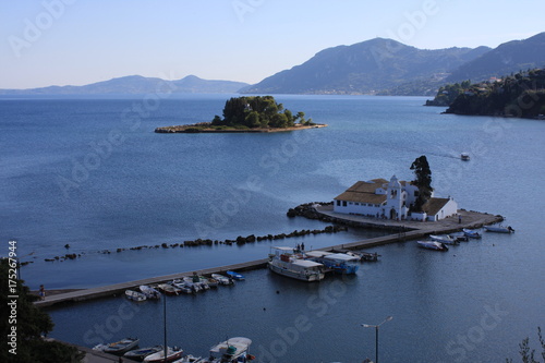 The church of Panagia Vlacherna and the island of Pontikonissi (mouse island) on Corfu, Greece. photo