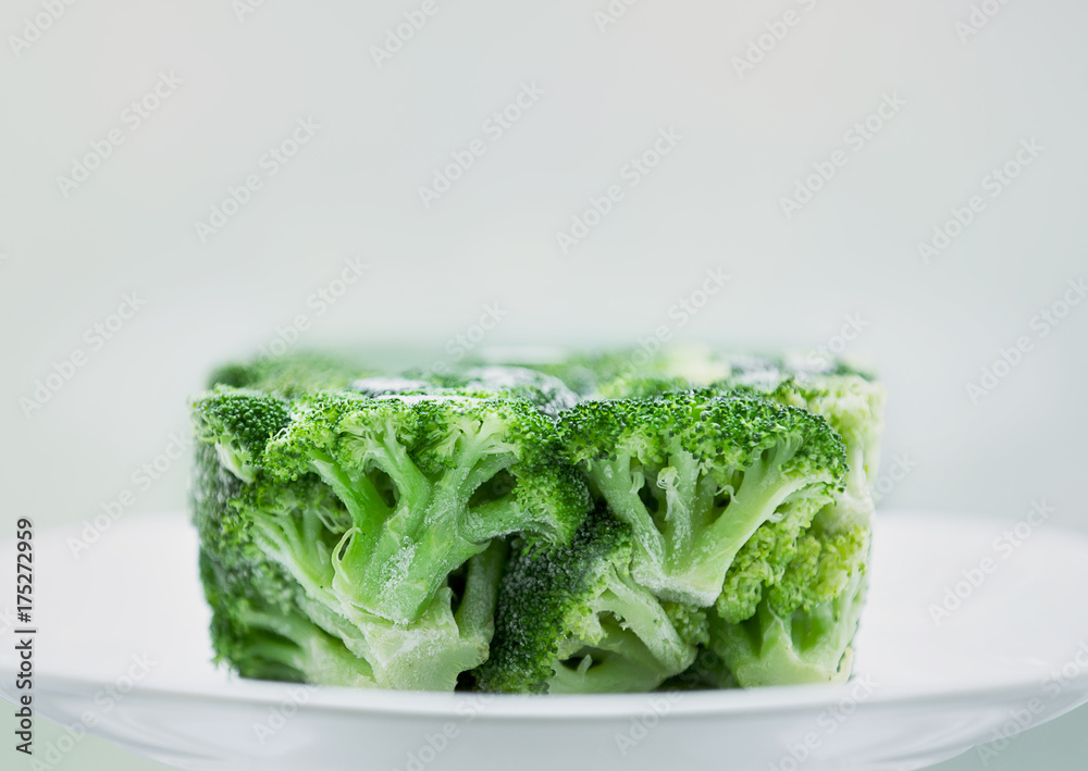 Broccoli frozen in a rectangular shape. Broccoli frozen in a rectangular shape.
