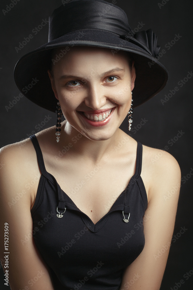 beautiful happy young woman in hat on black background beautiful happy young woman in hat on black background