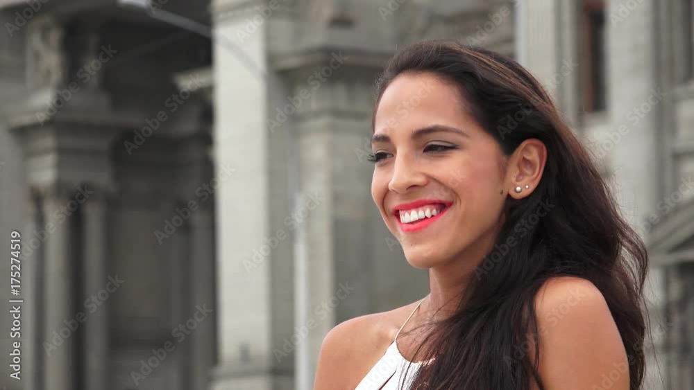 Young Hispanic Woman Laughing Young Hispanic Woman Laughing
