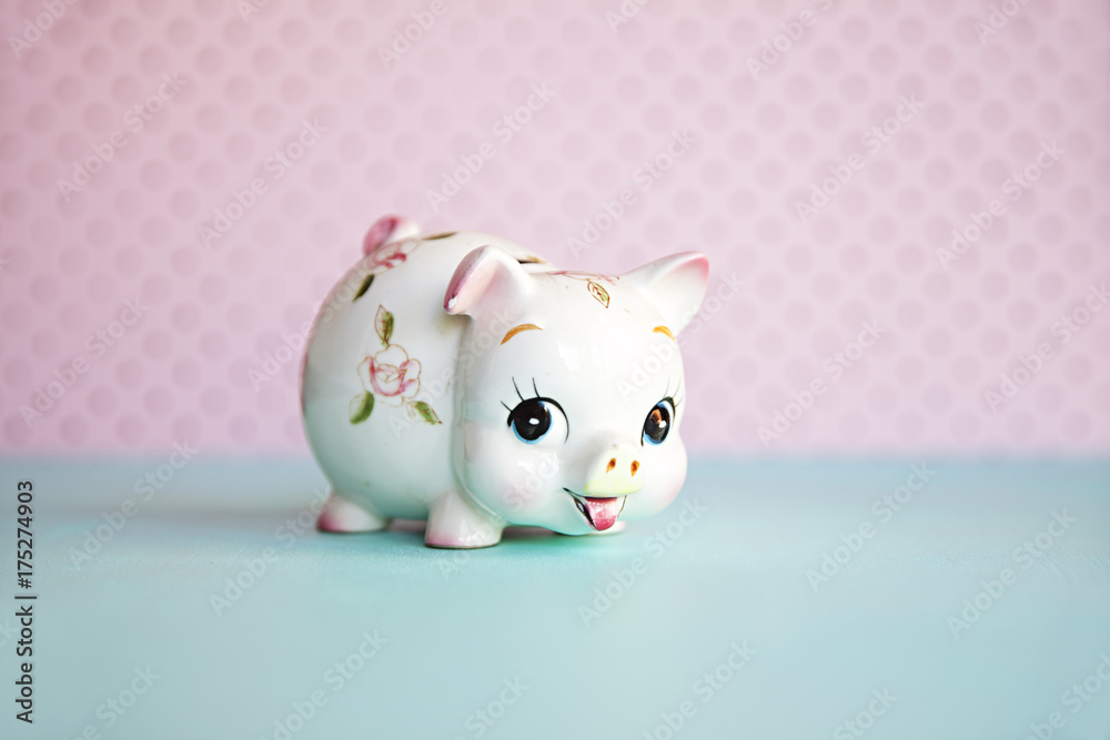 Cute piggy bank money box against pink background Cute piggy bank money box against pink background