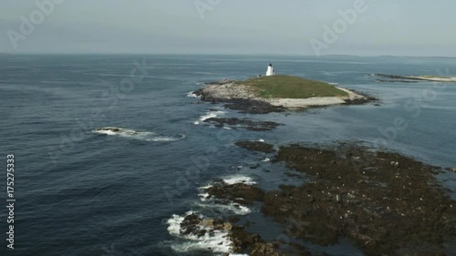 Remote island Lighthouse in Penobscot Bay, aerial photo