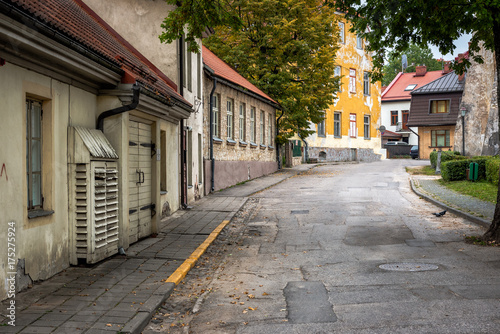 Narrow street with old buildings in Cesis town, Latvia