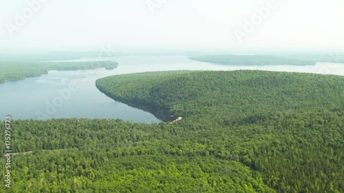 Aerial, lush forest by Brassua Lake 