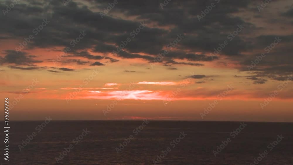 Wide, scenic sunrise over open ocean Wide, scenic sunrise over open ocean
