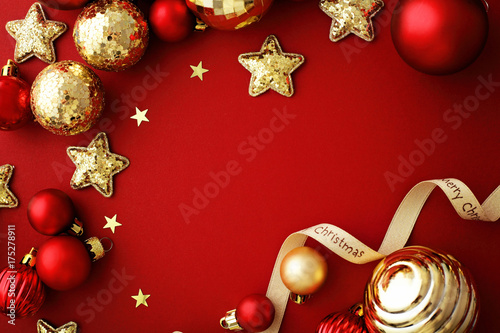 red and gold christmas ornaments frame background photo