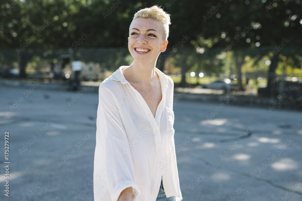 Happy and beautiful short hair girl having fun ooutdoors Happy and beautiful short hair girl having fun ooutdoors