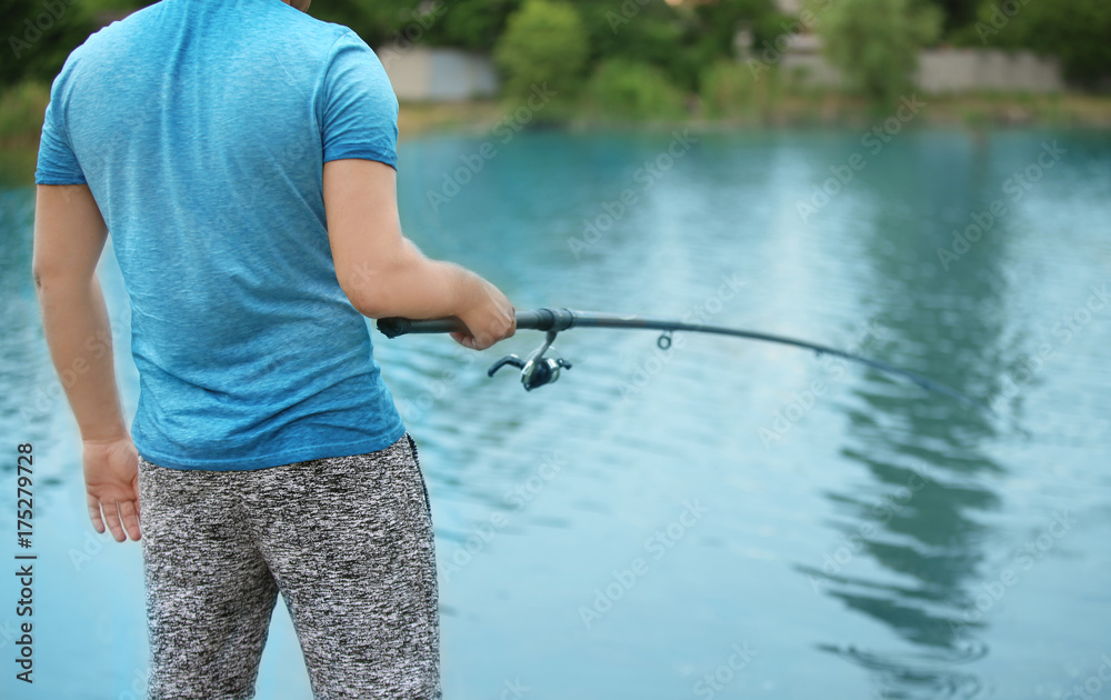 Man fishing on river Man fishing on river