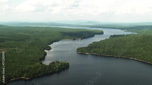 Wide aerial, scenic Richardson Lake in Maine