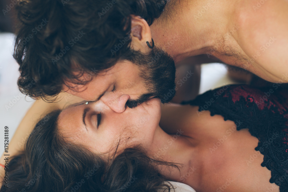 © Mosuno/Stocksy - Couple Passionately Kissing