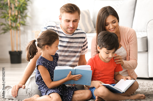 Happy family reading books ...