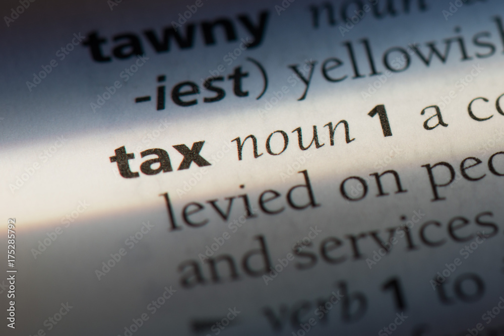 Tax word in a dictionary. Tax concept Tax word in a dictionary. Tax concept