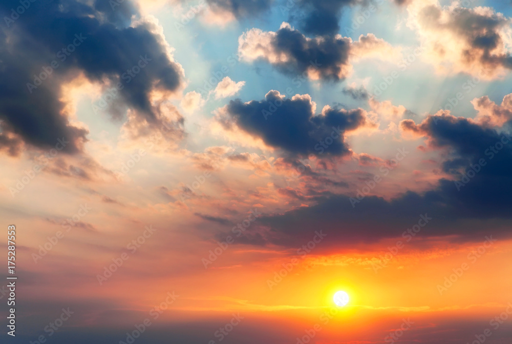 Sunset with sun rays. Colorful blur sky with sun background. Sunset, sunrise