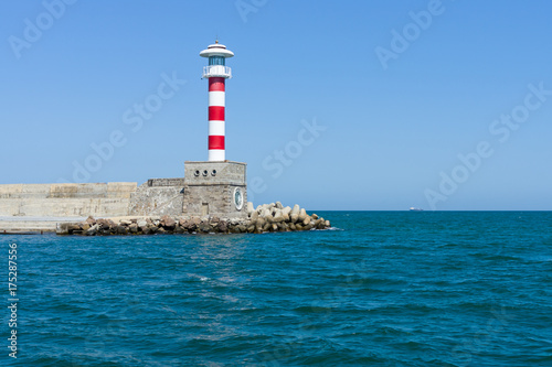 Lighthouse at the entrance to the water area of the sea port of Burgas. Bulgaria. © Sergey Kohl