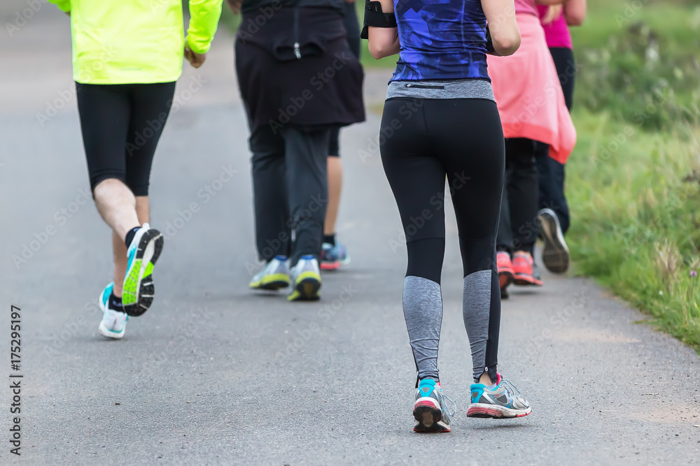 group of joggers on a country road group of joggers on a country road