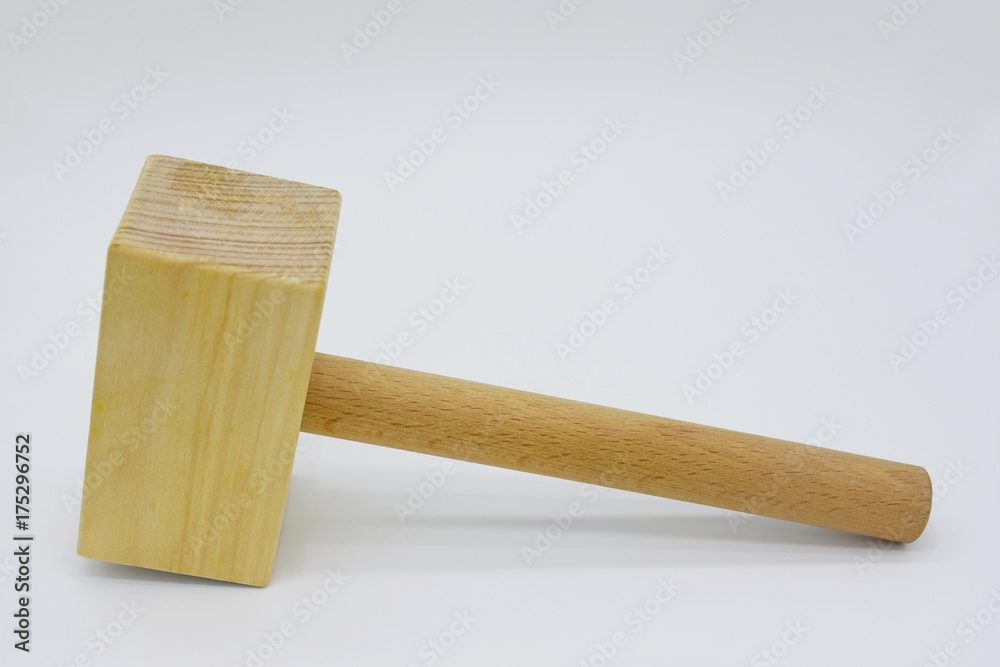 Wooden hammer on white background and copy space. Wooden hammer on white background and copy space.