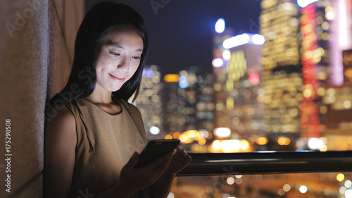 Canvas Print Woman working on cellphone in Hong Kong