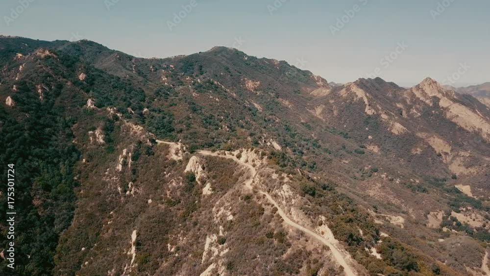 Cinema aerial panoramic video of the view of mountain formations in Malibu from a helicopter. Los Angeles, California, USA. Cinema aerial panoramic video of the view of mountain formations in Malibu from a helicopter. Los Angeles, California, USA.