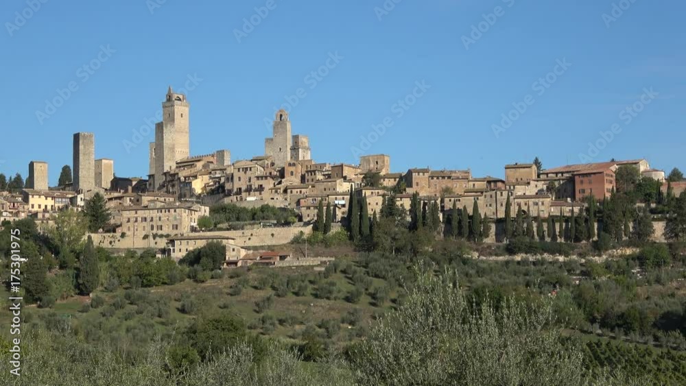 The medieval town of San Gimignano, sunny september day. Italy The medieval town of San Gimignano, sunny september day. Italy