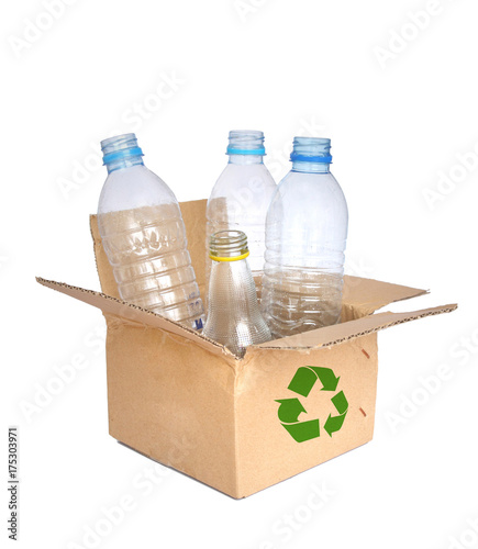 Plastic bottles  in a recycled shipping box