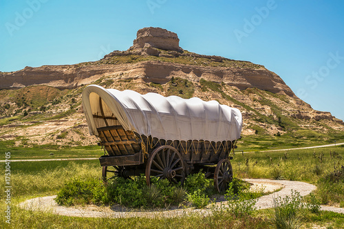 Sunlit Covered Wagon at Scotts Bluff National Monument in Nebraska photo