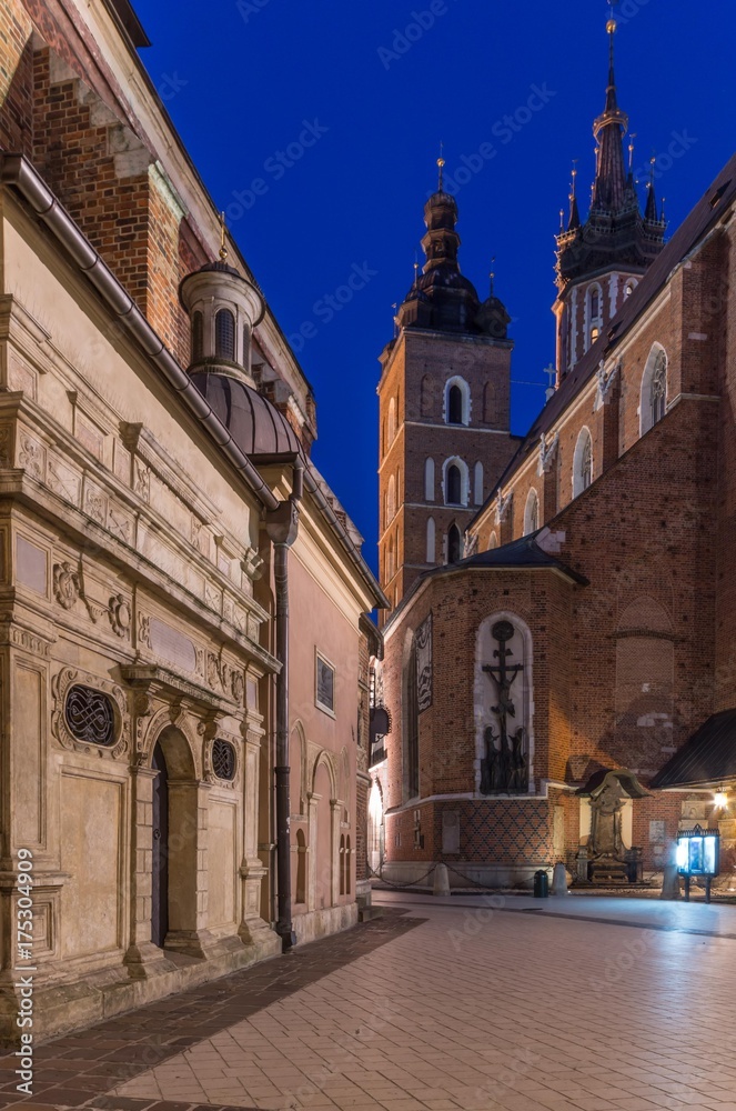 Krakow, Poland, Mariacki square between St Mary's church and St Barbara's church in night