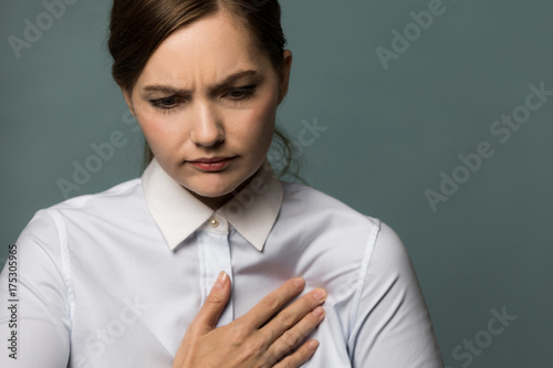 Canvas Print Young woman having heart ache.