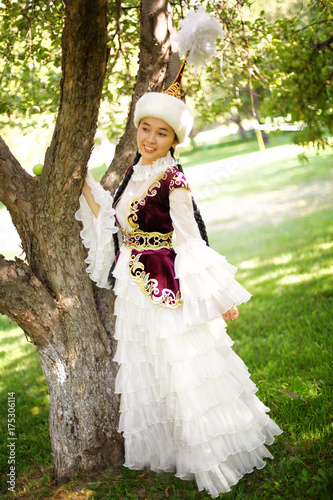 Beautiful kazakh woman in national costume photo