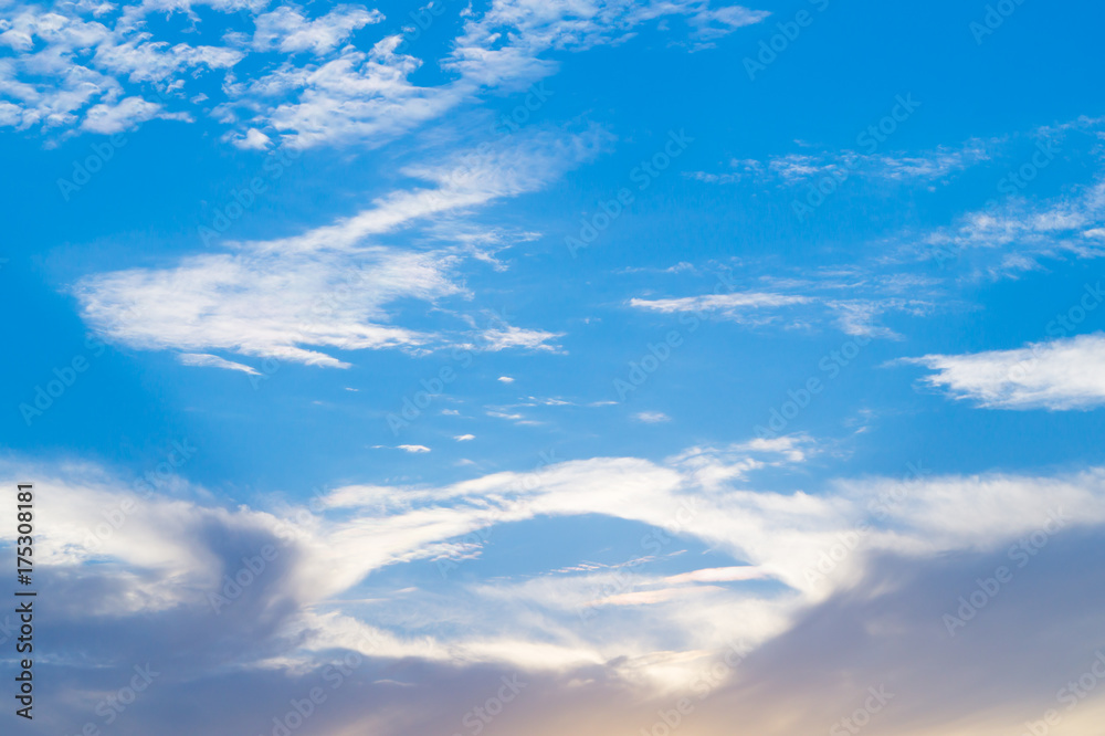 Fototapeta premium White and grey fkuffy clouds on the light-blue sky