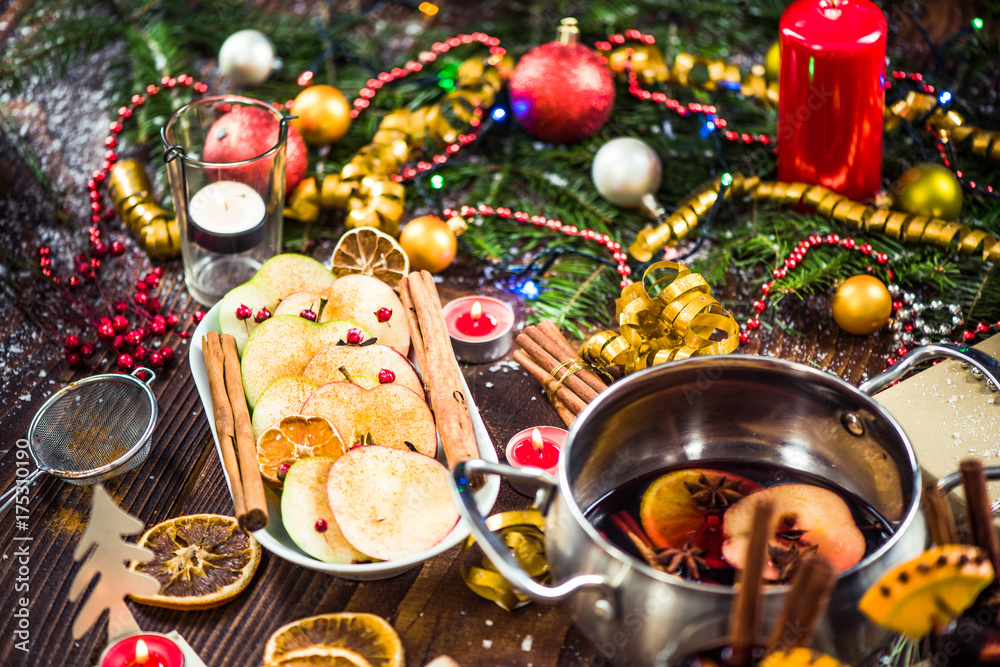 Spiced apples with cinnamon on Christmas festive table Spiced apples with cinnamon on Christmas festive table