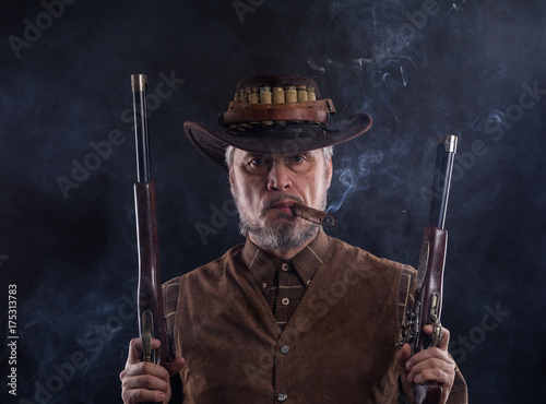 Wild West, cowboy with weapons