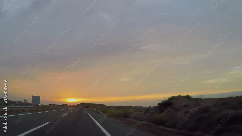 driving and traveling on the motorway at dawn(subjective view from the car) driving and traveling on the motorway at dawn(subjective view from the car)