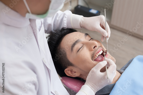 A man with dental care activity