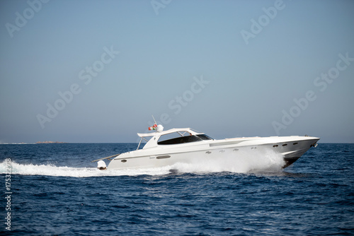 Fast motor boat on sea © ventura