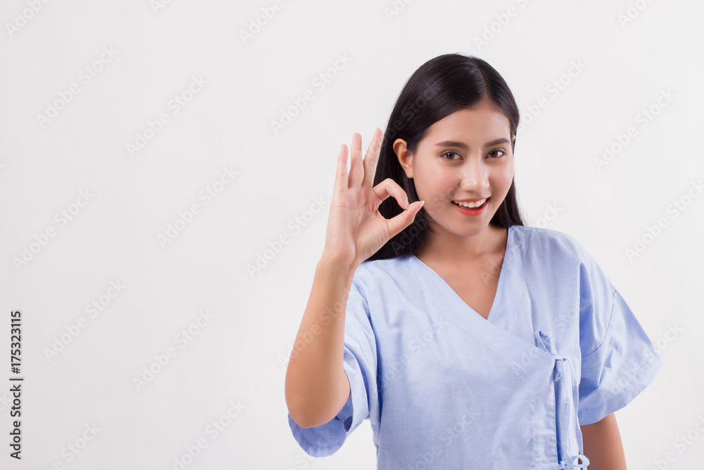 injured woman patient pointing up ok hand gesture injured woman patient pointing up ok hand gesture