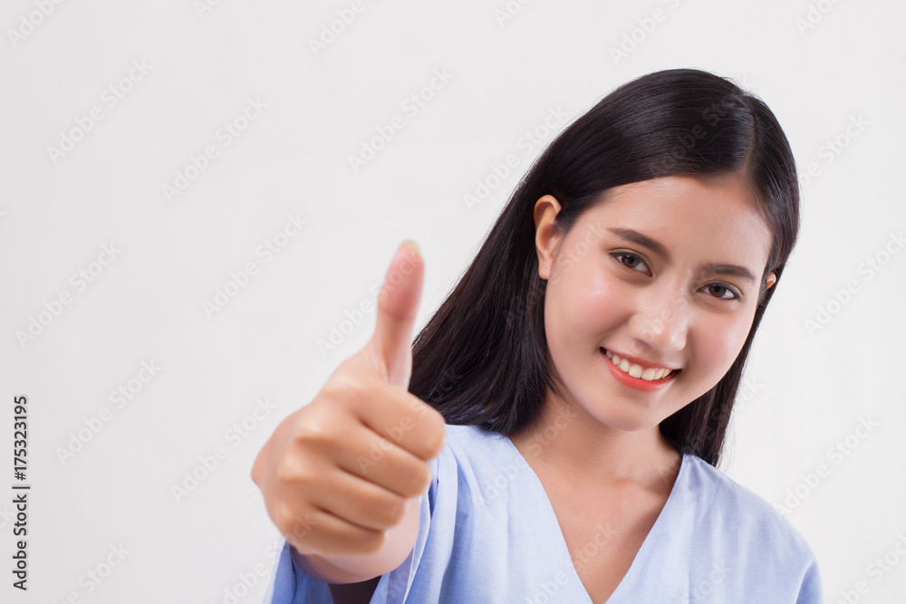 injured woman patient pointing thumb up hand gesture injured woman patient pointing thumb up hand gesture