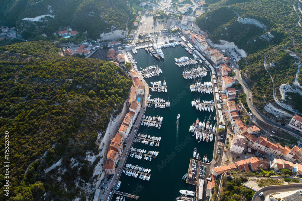Aerial view of boats and yachts in marina of historical city Bonifacio, Corsica, France