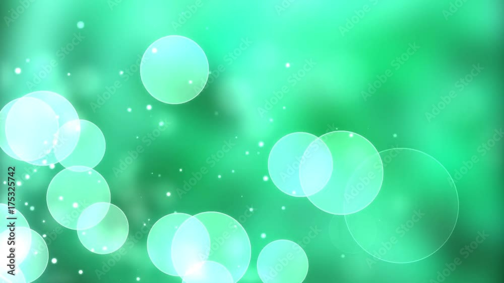 Abstract Green Christmas motion cg background. Sparkles and round glitter bokeh particles and light. New year collection Abstract Green Christmas motion cg background. Sparkles and round glitter bokeh particles and light. New year collection