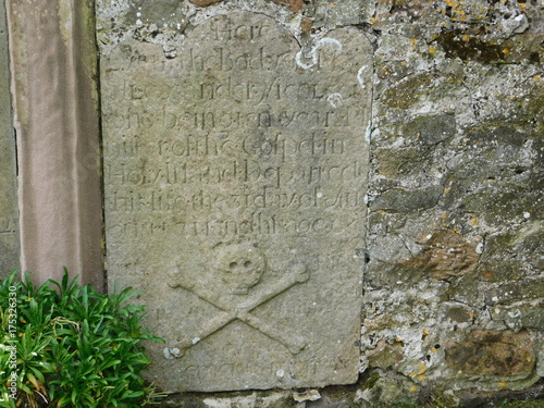 Skull and Cross Bones markings on gravestone on Lindisfarne (The Holy Island)