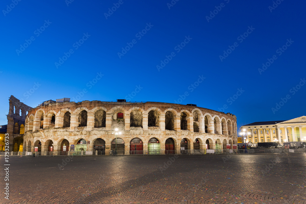 Ancient roman amphitheatre Arena in Verona, Italy at night blue hour sunrise.