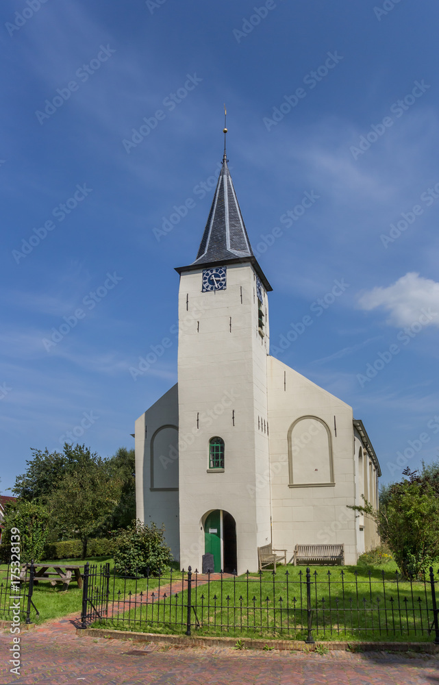White church in the Groningen town of Feerwerd