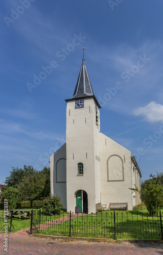 White church in the Groningen town of Feerwerd