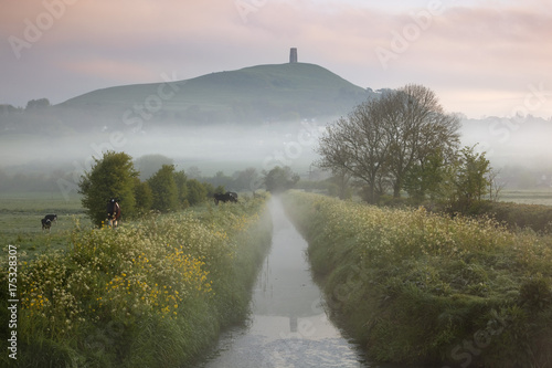 Dawn mist below Glastonbury Tor, Glastonbury, Somerset photo