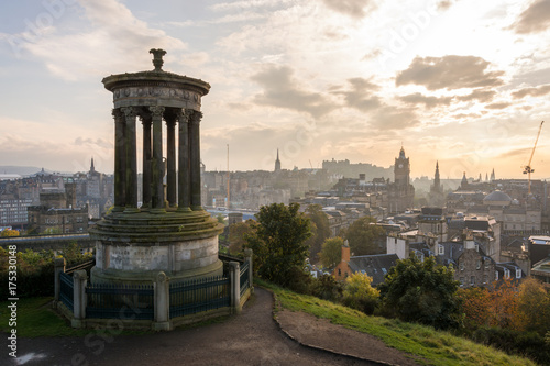 Dugald Stewart monument on Calton Hill with a view on Edinburgh castle