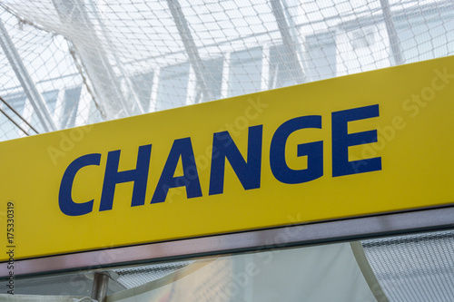 Blue and yellow change sign to change money