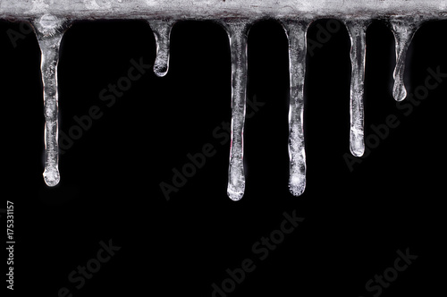 Fototapeta icicles, drops, isolated on a black background