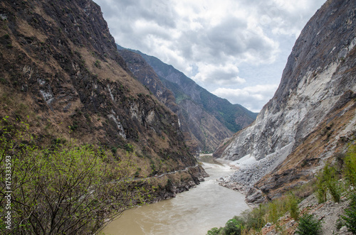 The torrential flow through the hills in Tibet