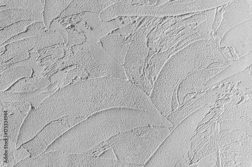 しっくいの壁　Unique pattern of white plaster photo