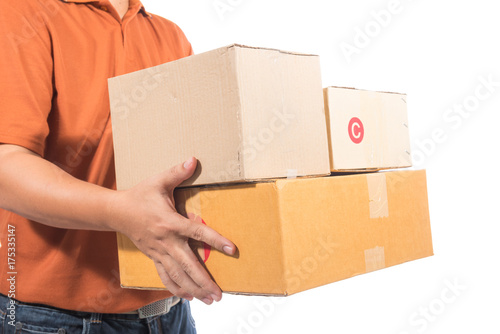 delivery man in brown uniform holding a package box isolated on white background