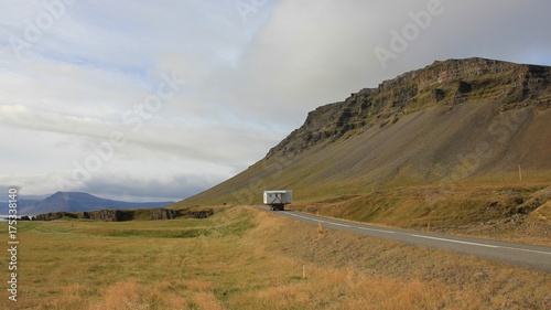 House moved on a truck. Scene at the west coast of Iceland.